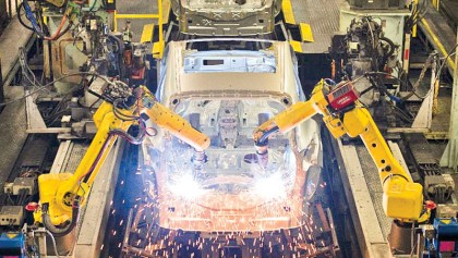 Robot arms replace factory hands
