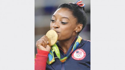 Biles bows out with 4 gold