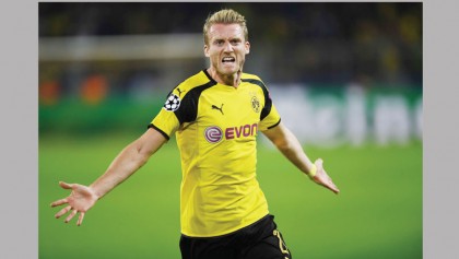 Schuerrle strikes late as Dortmund deny Real