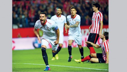 Sevilla maintain title chase