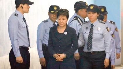 South Korea’s Park denies charges as corruption trial begins  