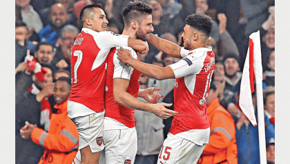 Arsenal revive Champions League hopes
