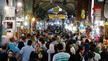 Tehran bazaar blends hope, caution 
a year after nuclear deal