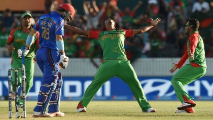 Khan's four-for helps Afghanistan clinch T20 series