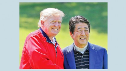Trump downplays North Korea missile launches on Japan visit