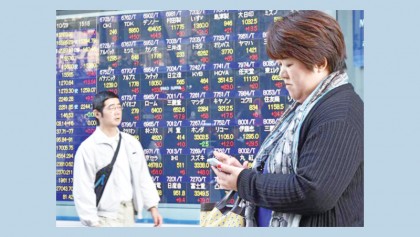 Asian markets mixed after strong US jobs data