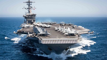 US Navy evacuates 
aircraft carrier 
