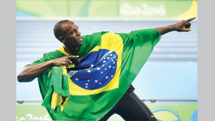 Bolt ‘the greatest’ bows out with ‘triple triple’  