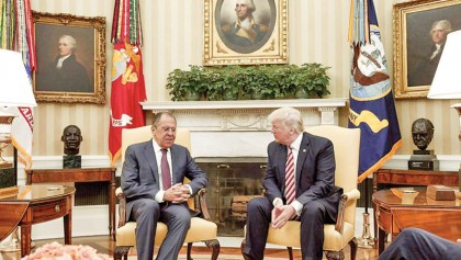 White House fumes after Moscow releases Trump meeting photos