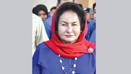 Wife of ex-Malaysian leader charged with money laundering