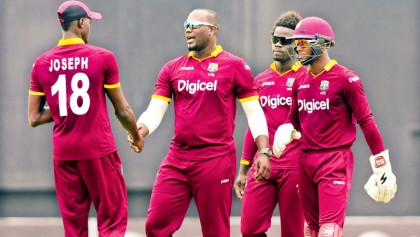 Lewis ton steers Windies to thumping win