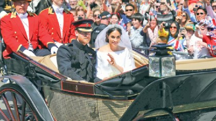 Windsor cheers, waves flags
