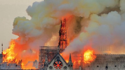 Workers questioned over fire as donations pour in