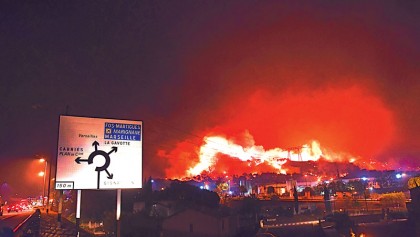 Wildfires tamed in southern France as new blazes feared
