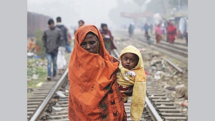 Country reels under cold wave, fog