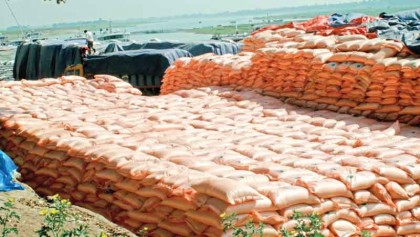 Huge fertiliser in plastic bags lying under open sky