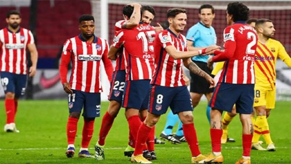 Atletico edge past Barca to earn title boost as Real Madrid held
