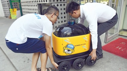 In China, yellow robots deliver snacks to your home