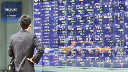 Strong earnings, economic data push Asia markets higher