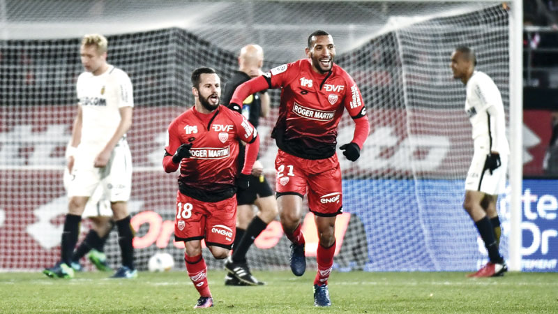 Cheeky Fabinho puts 
Monaco clear at top