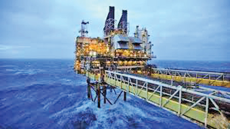 World oil prices rise on fall in US inventories