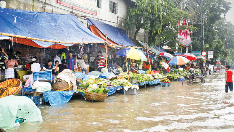 Heavy rains leave Dhaka streets flooded