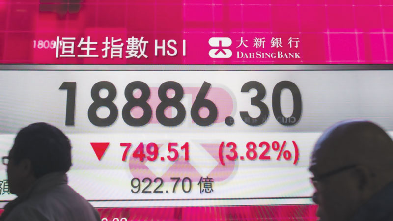 Asian markets mostly down, 
pound dips after London attack