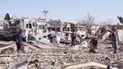 Taliban car bomb
flattens hospital as Afghan violence surges