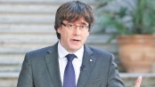 Catalonia’s axed leader ‘in Brussels’