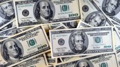 Dollar extends rally in Asia