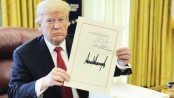 Donald Trump signs tax cut bill into law