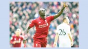 Firmino, Mane keep Liverpool in race