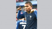 France battle into last 16