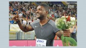 Gatlin digs deep, Ayana misses world record