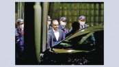 Ghosn wins bail in Japan but banned from seeing wife