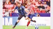 Griezmann scores twice as Atletico see off Brugge