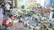Huge HK rally after student dies