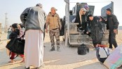 Iraqi forces try to weed out IS from those fleeing Mosul