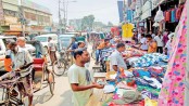 Makeshift shops add woes 
to people in Khulna  