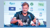 Klopp committed to Reds for at least three more years 