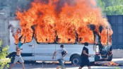 Kyrgyz court holds former
president after raid