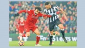 Liverpool advance  to second place