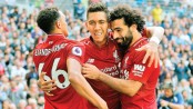 Liverpool punish sloppy Spurs for fifth straight win