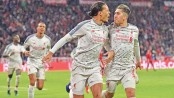Liverpool rout Bayern to reach quarters