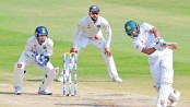 Indian spinners tame fighting Bangladesh