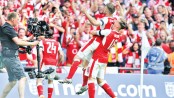 Mertesacker returns to inspire Arsenal’s cup glory