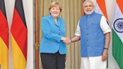 Modi, Merkel agree to fast-track business deals in India