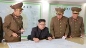 North Korea leader holds off on Guam missile plan