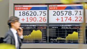 Most Asian markets rise but Syria, 
N Korea worries sap gains
