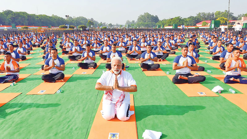 Strike a pose: International Yoga Day stretches around world